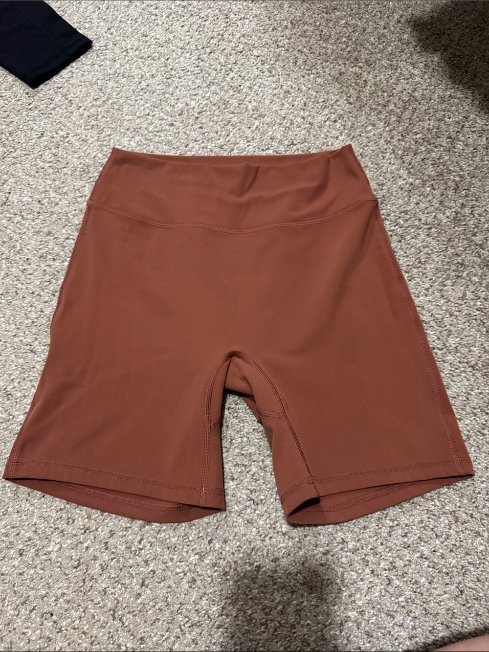 Buffbunny High-Waist Women’s me 6”Biker Shorts in a Rust/brownish/reddish color